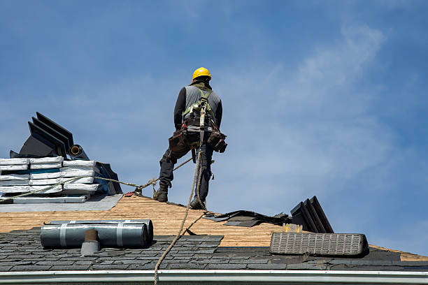 Professional Roof Replacement technician working in Cement, OK
